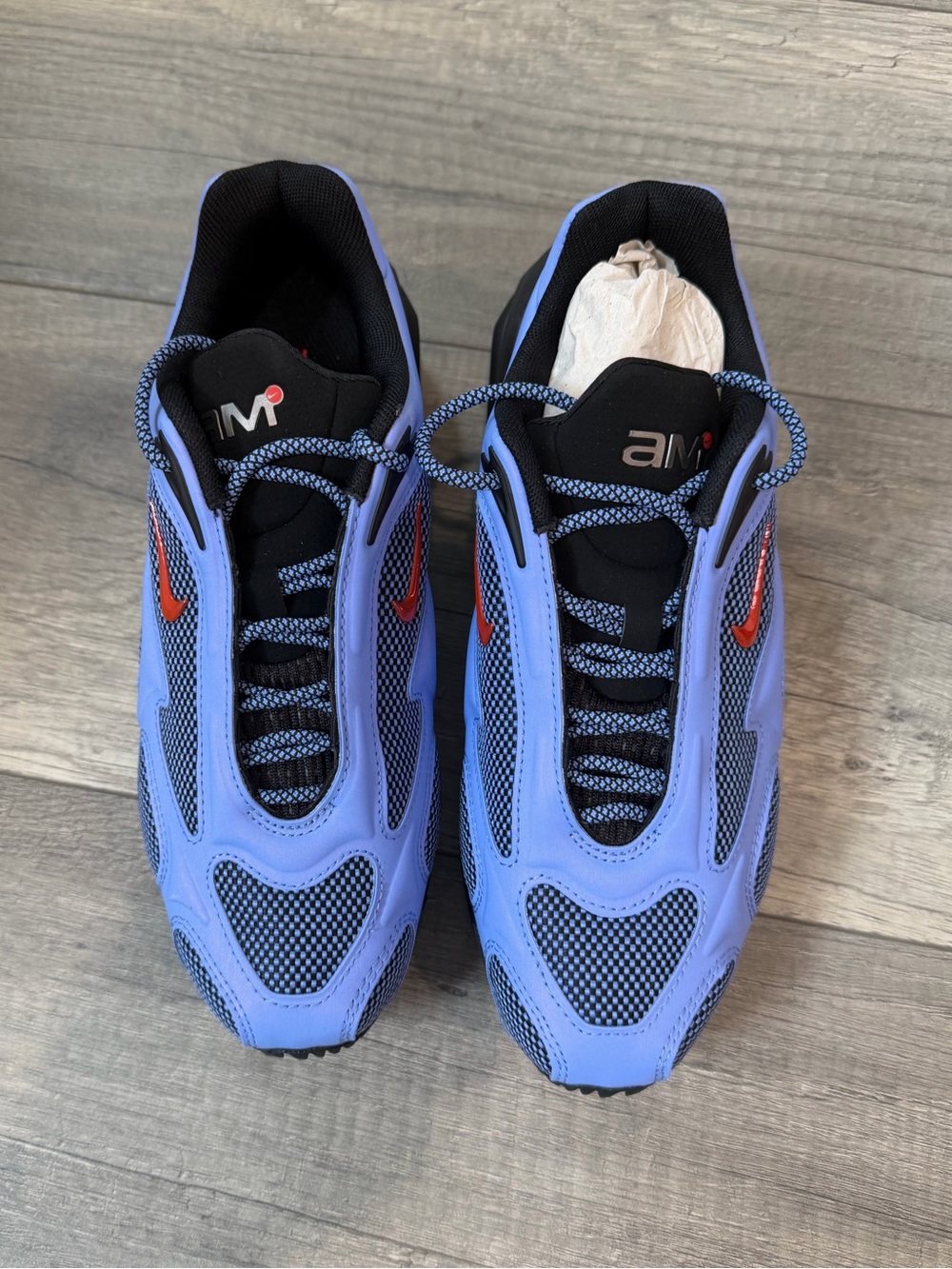 Nike Women’s Sneakers in Periwinkle Blue with Red Swoosh